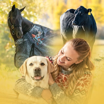 Fall Catalogs 2026. A woman in a patterned sweater hugs a Labrador, a dark horse wearing a Jeffers Expression Cosmic Cowgirl Blanket and a black cow in the background.